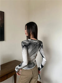 Cyber Y2K Armour Graphic Mesh Long Sleeve Top — dettaglio