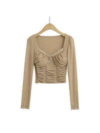 Lace Y2K Cropped Long Sleeve Low Cut Top — dettaglio del tessuto