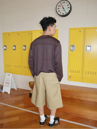 Layered Y2K Long Patchwork Shorts — dettaglio della stampa