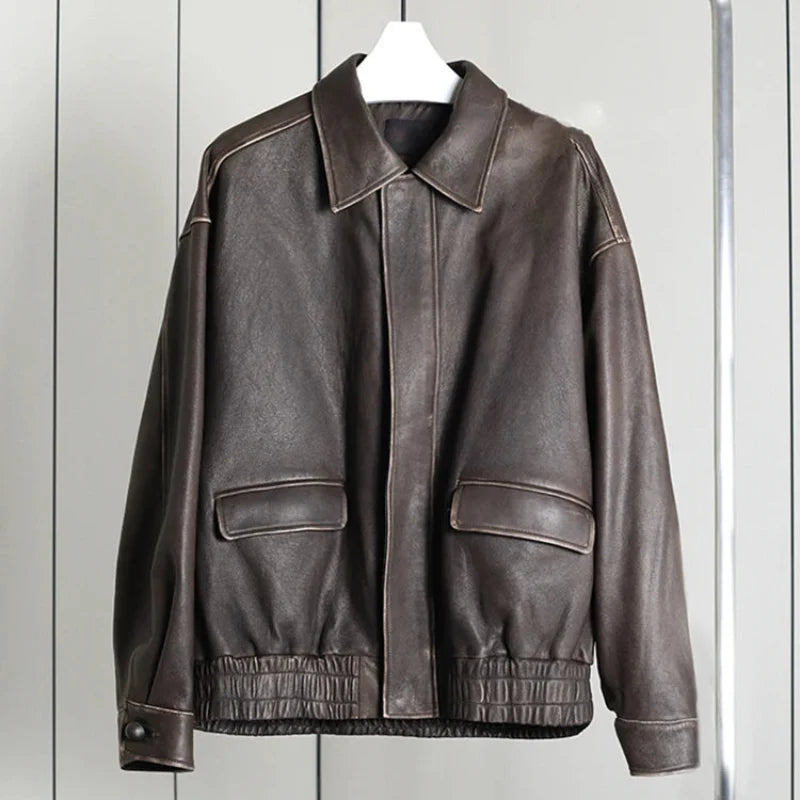 Retro Y2K Oversized Distressed Brown Faux Leather Jacket — dettaglio del tessuto