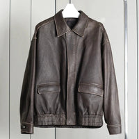 Retro Y2K Oversized Distressed Brown Faux Leather Jacket — dettaglio del tessuto
