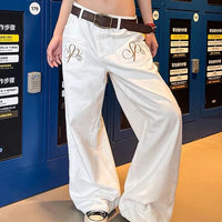 White Y2K Embroidered Baggy Jeans — vista posteriore