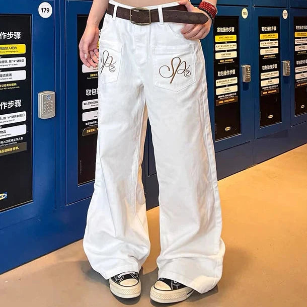 White Y2K Embroidered Baggy Jeans — in alternativa