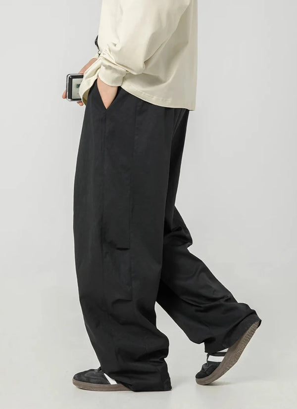 Wide Leg Curved Y2K Parachute Trousers — vista frontale