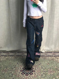 22 Tour Team Graphic Cargo Boot Cut Jeans — dettaglio del tessuto