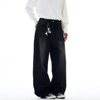 77 Star Patchwork Embroidered Baggy Jeans — dettaglio del tessuto