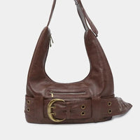 Aged Leather Belted Handbag — dettaglio della stampa