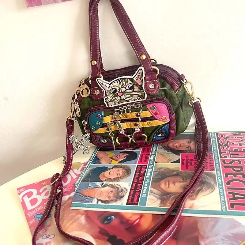 Babes Cat Leather Handbag — dettaglio del tessuto