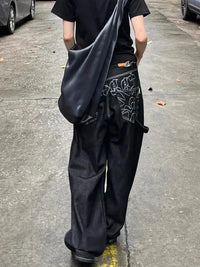 Baggy Black Embroidered Jeans — in alternativa
