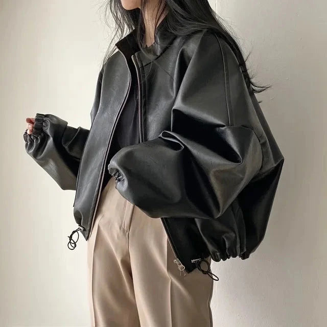 Baggy Black Leather Jacket — vista posteriore