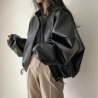 Baggy Black Leather Jacket — vista posteriore