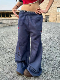Baggy Blue Graphic Sweatpants Joggers Trousers — dettaglio della stampa