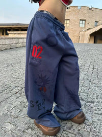 Baggy Blue Graphic Sweatpants Joggers Trousers — vista frontale