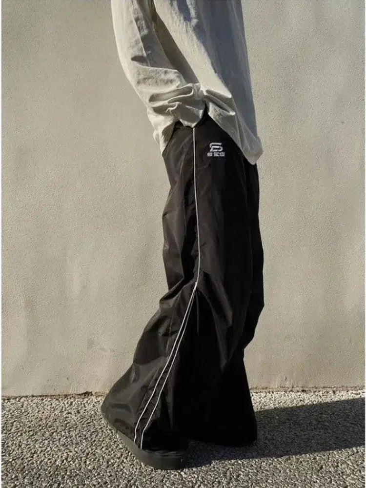 Baggy Shell Joggers Trousers — in alternativa