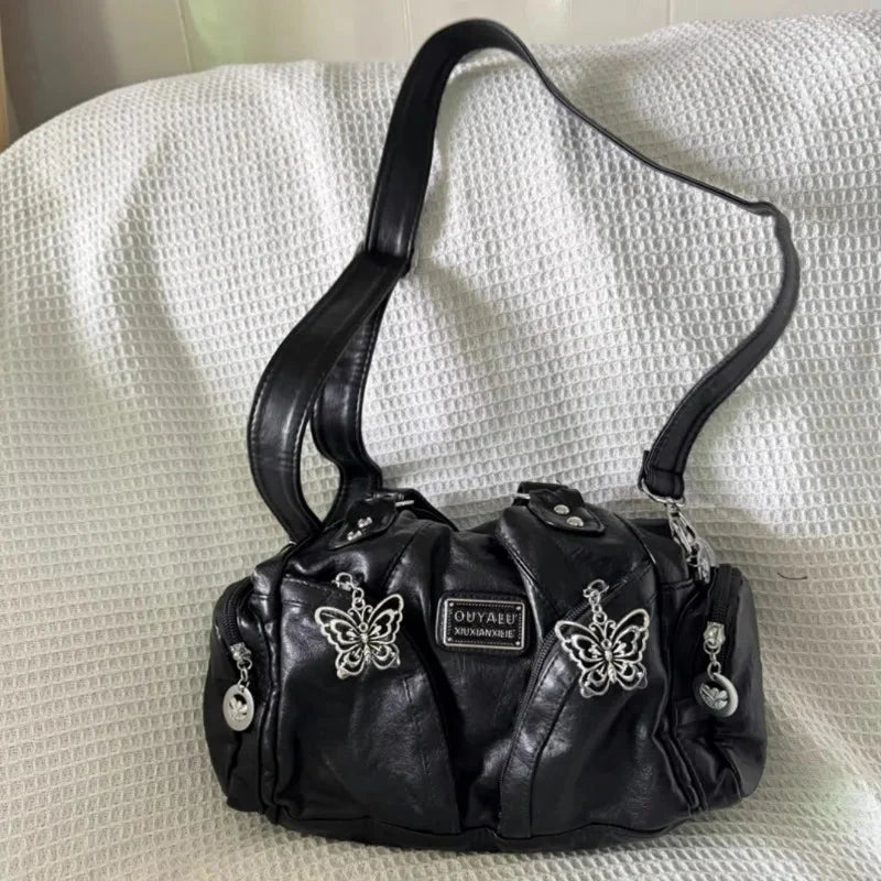 Black Butterfly Leather Handbag — dettaglio del tessuto