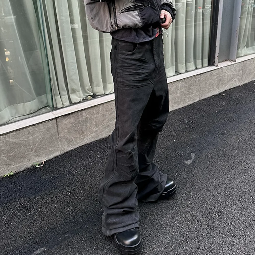 Black Waxed Boot Cut Jeans — dettaglio della stampa
