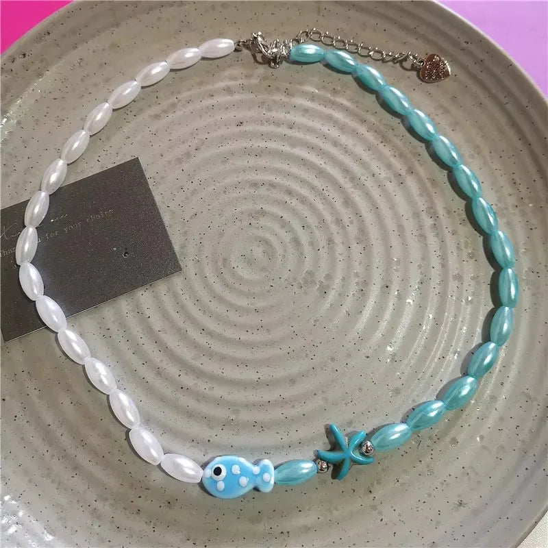 Ceramic Fish Pendant Beaded Choker Necklace — dettaglio della stampa