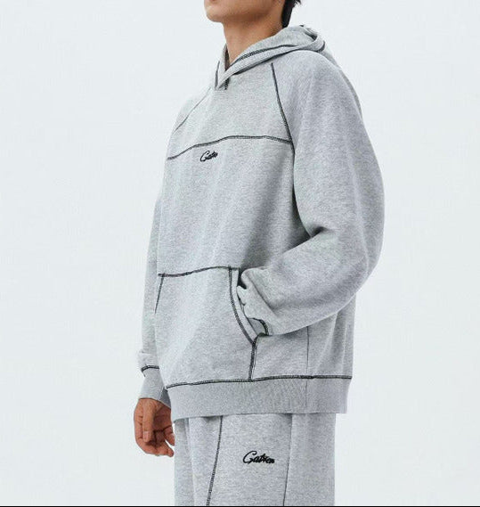 Contrast Stitch Embroidered Hoodie — dettaglio della stampa