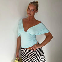 Cropped Low Cut Backless Halter Top — dettaglio del tessuto