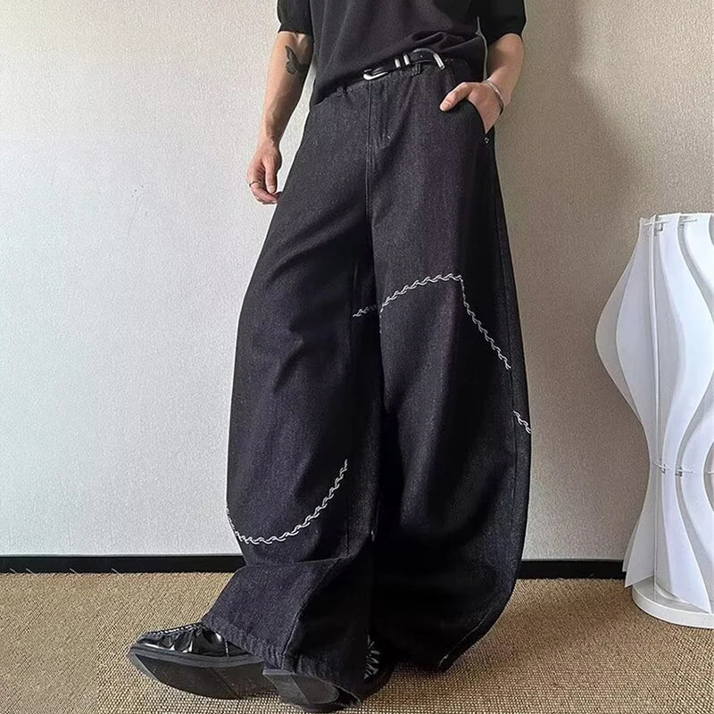 Curved Chain Graphic Barrel Denim Jeans — in alternativa
