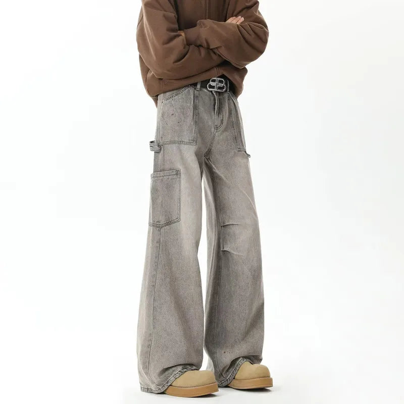 Cyber Distressed Grey Pleated Baggy Boot Cut Cargo Jeans — dettaglio del tessuto