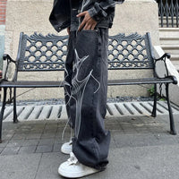 Cyber Embroidery Stacked Baggy Jeans — dettaglio della stampa