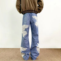 "Dove Of Peace" Embroidered Baggy Denim Jeans — dettaglio della stampa