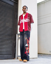 Dragon Graphic Baggy Embroidered Jeans — dettaglio del tessuto