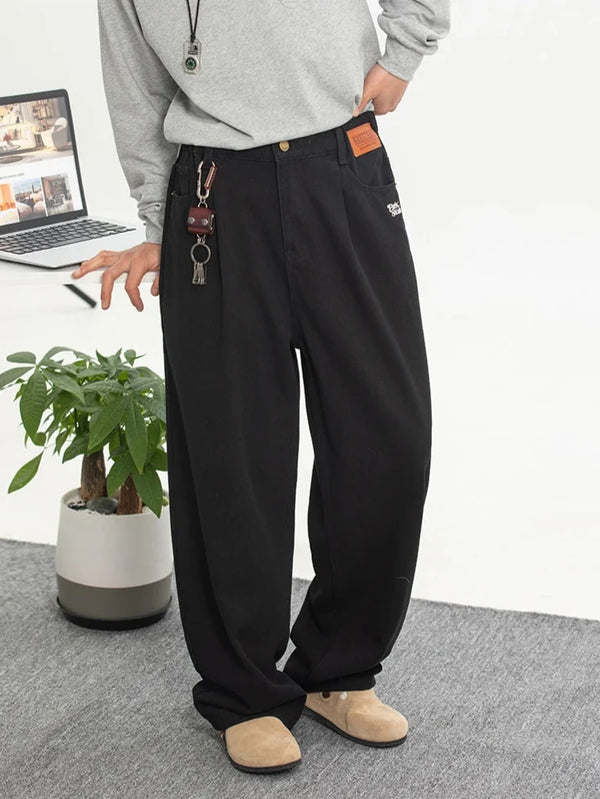 Embroidered Black Baggy Jeans — vista frontale