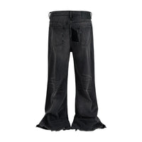 Embroidered Patchwork Distressed Baggy Black Denim Jeans — vista laterale