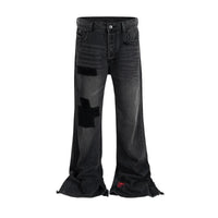 Embroidered Patchwork Distressed Baggy Black Denim Jeans — vista frontale