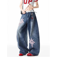 Embroidered Patchwork Star Wide Leg Barrel Jeans — dettaglio del tessuto