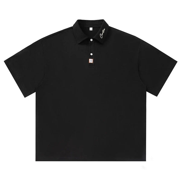 Essentials Polo Shirt — vista frontale