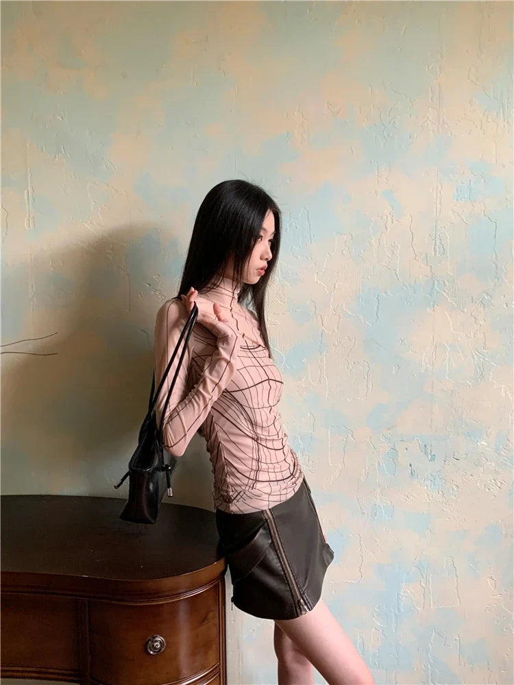 Geometric Long Sleeve Mesh Top — dettaglio della stampa