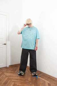 Give Me Money Graphic T Shirt — in alternativa
