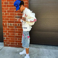 Graffiti Graphic Rhinestone Distressed Shorts Jorts — dettaglio della stampa