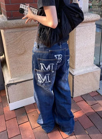 High Waist Print Graphic Multi Pocket Jeans — dettaglio della stampa