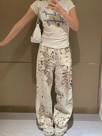 High Waisted Snow Leopard Denim Jeans — dettaglio