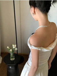 Kink Off Shoulder Slim Crop Top — dettaglio del tessuto