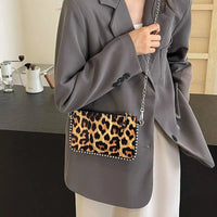 Leopard Leather Mini Handbag — vista laterale
