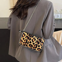 Leopard Leather Mini Handbag — dettaglio del tessuto