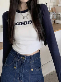 Long Sleeve Embroidered Top — dettaglio del tessuto