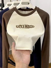 Long Sleeve Embroidered Top — dettaglio