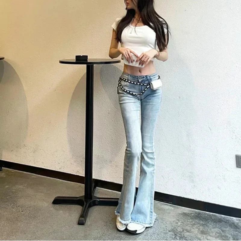 Low Waist Super Skinny Flared Jeans — dettaglio della stampa