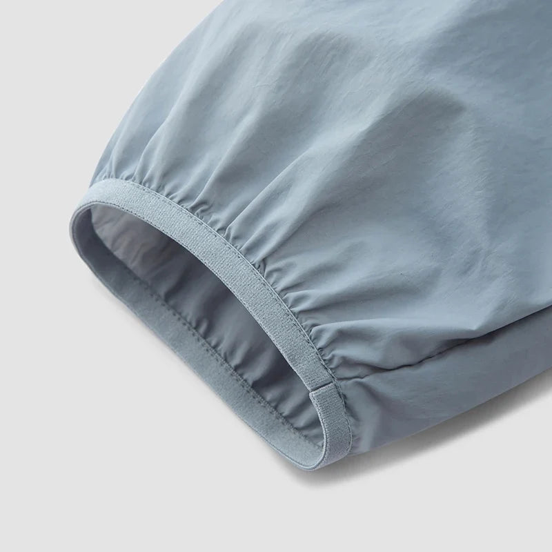 Lightweight Breathable Windbreaker Jacket — vista laterale
