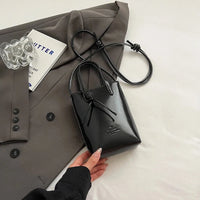 Mini Leather Crossbody Handbag — vista frontale