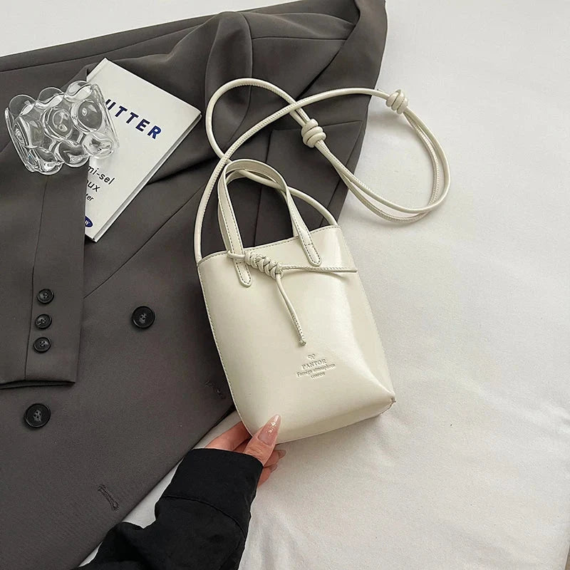 Mini Leather Crossbody Handbag — dettaglio della stampa