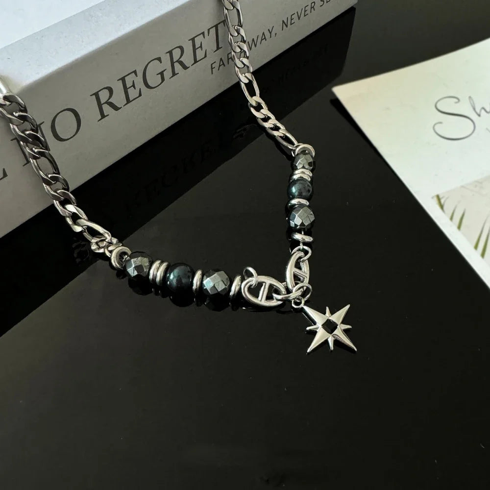 Obsidian Star Pendant Necklace — dettaglio del tessuto