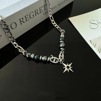 Obsidian Star Pendant Necklace — dettaglio del tessuto