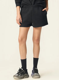 Origin 350gsm Mini Essentials Shorts — dettaglio della stampa